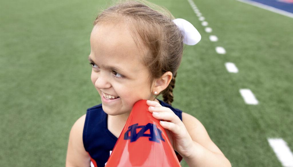 KK in her cheerleading outfit